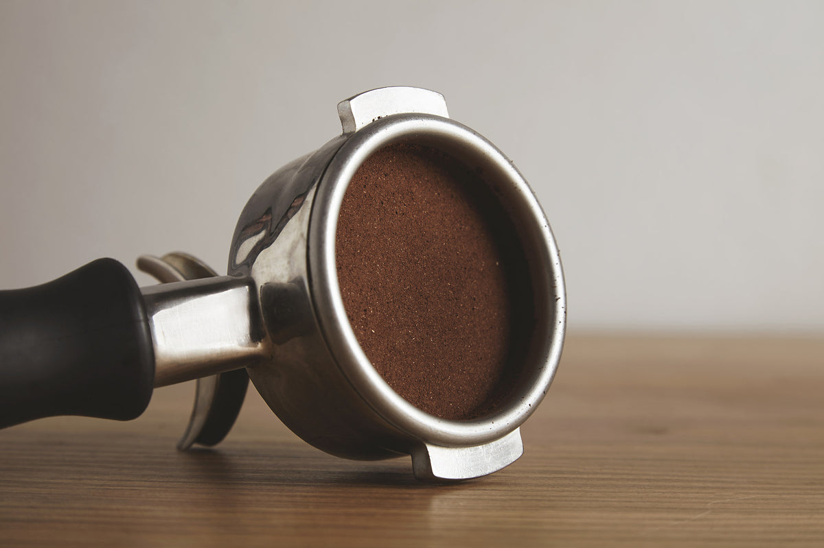 Espresso portafilter with fresh ground coffee