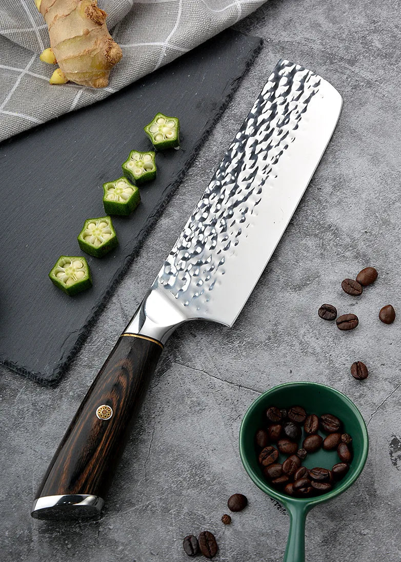 Wudy Kitchen Wudy Hammered Stainless Steel Kitchen Knife — chef knife — hero view on marble countertop