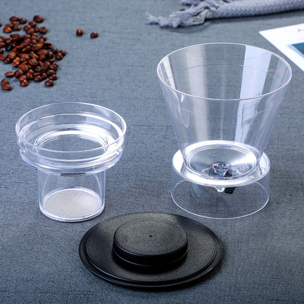 Wudy Kitchen Wudy Ice Drip Pour-Over Carafe — borosilicate glass, stainless fittings — in-use detail shot