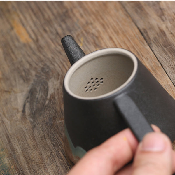 Wudy Kitchen Wudy Japanese Ceramic Teapot — underglaze ceramic, precision pour spout — top-down view with context