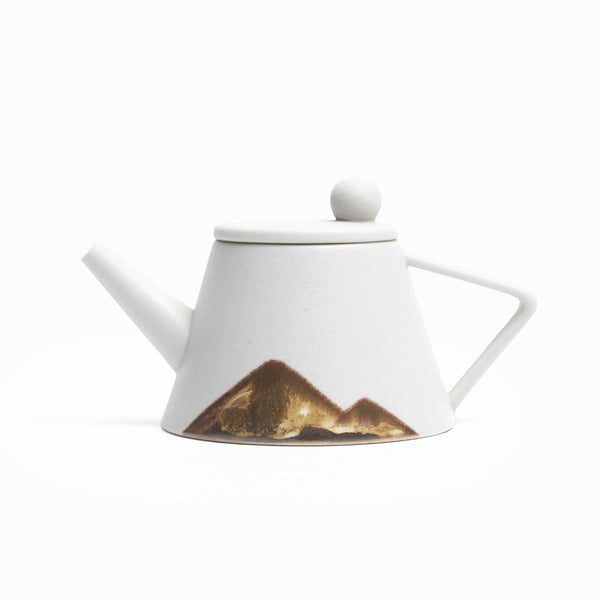 Wudy Kitchen Wudy Japanese Ceramic Teapot — underglaze ceramic, precision pour spout — in-use detail shot
