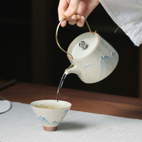Handmade Ceramic Teapot with Mountain Design – Brass Handle