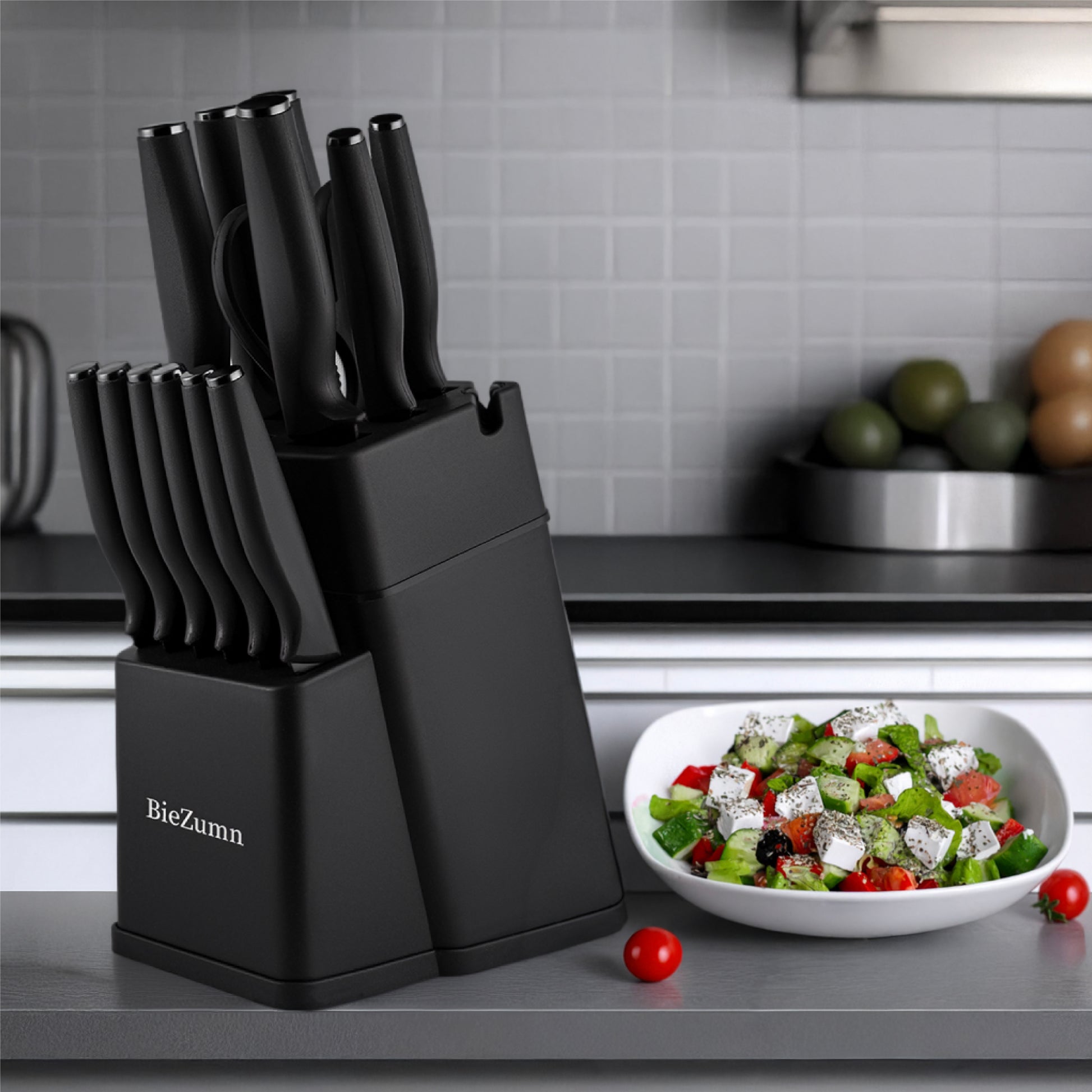 Wudy knife set in black handle variant — sleek block and cutting board on dark kitchen surface