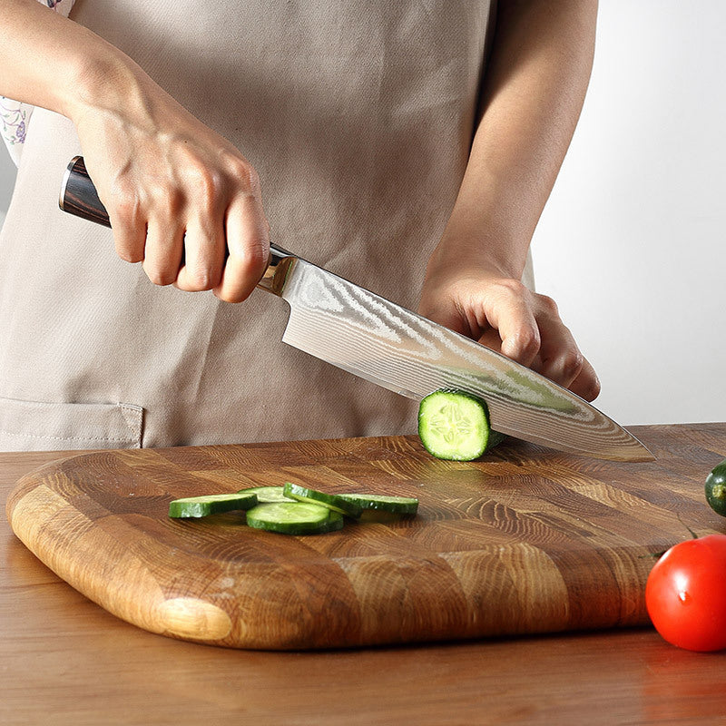 Wudy Kitchen Wudy Damascus Steel Chef Knife — 67-layer Damascus steel, pakkawood handle — hero view on marble countertop