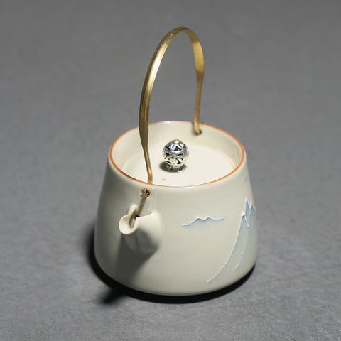 Handmade Ceramic Teapot with Mountain Design – Brass Handle